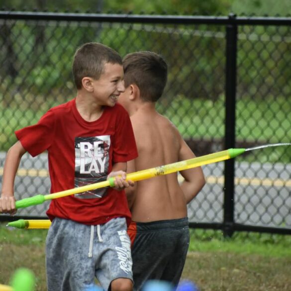 Water gun fight between police, campers ends with multiple smiles - photo licensed by shore news network.