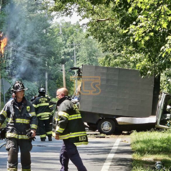 Major crash in jackson township: overturned truck and utility polefire - photo licensed by shore news network.
