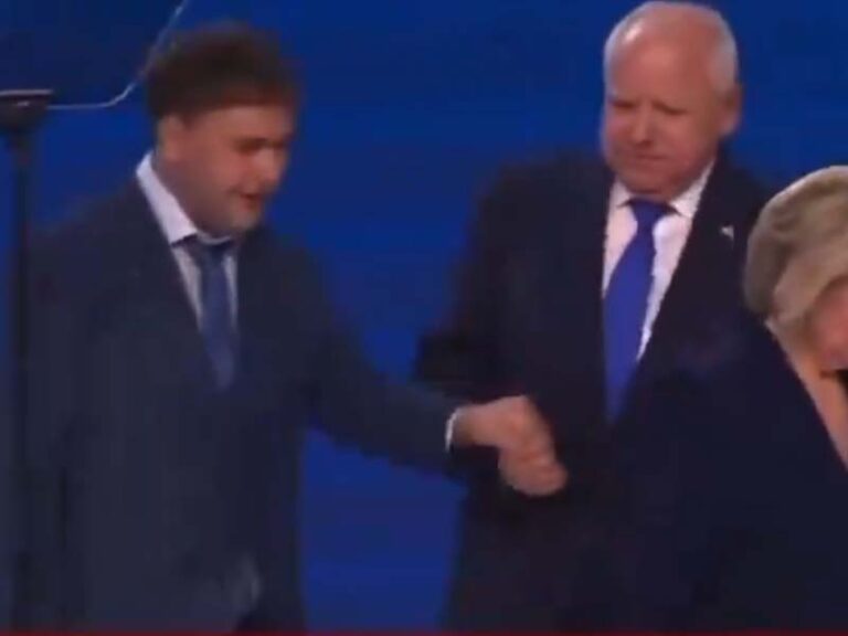 Tim walz, america's favorite dad, forcibly yanks son on dnc stage - photo licensed by shore news network.