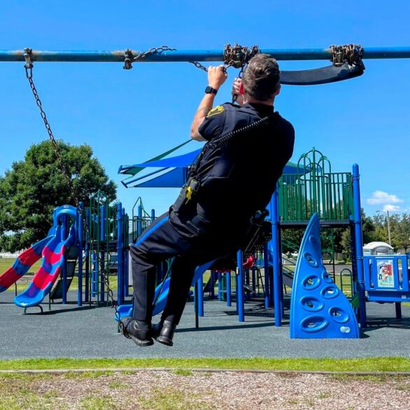 Gloucester township officer gets tangled up solving playground problem - photo licensed by shore news network.
