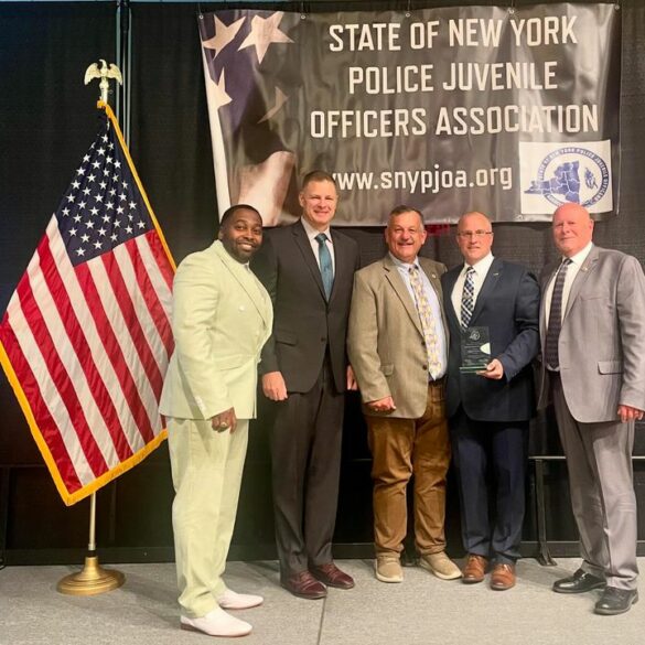 Dutchess county sheriff's sgt. Alonzo montanya honored as new york state youth officer of the year - photo licensed by shore news network.