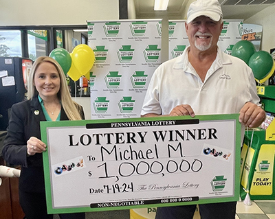 $1 Million Check Presented To Lottery Winner in Washington County $1 Million Check Presented To Lottery Winner in Washington County