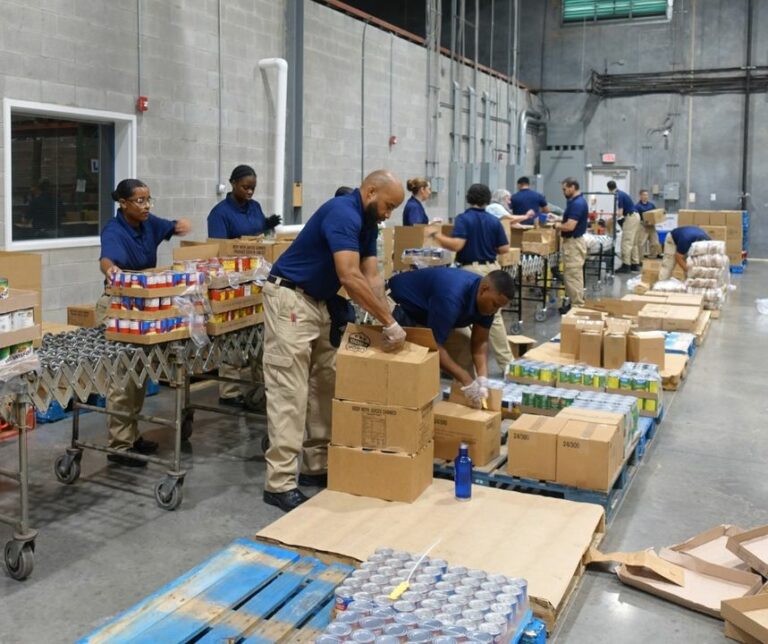Newport news police recruits lend a helping hand at local foodbank - photo licensed by shore news network.