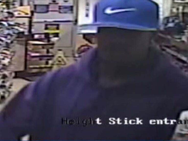 Armed robber pointed gun at gas station clerks and emptied the cash registers - photo licensed by shore news network.