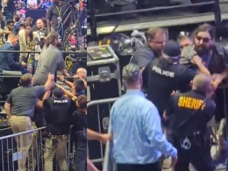 Aggressive protester stopped by police as he rushed toward stage at trump pennsylvania rally - photo licensed by shore news network.