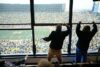 Yes, tim walz really did cheer wildly at an empty football field during a college football game