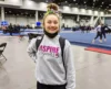 College gymnast fatally shot in off-campus apartment; suspect in custody