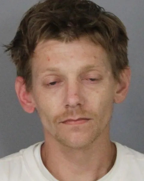 Newark man arrested on gun, drug, and DUI charges after traffic stop