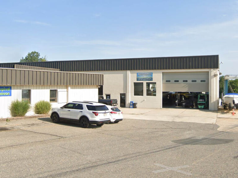 Toms river marina garage damaged by fire - photo licensed by shore news network.