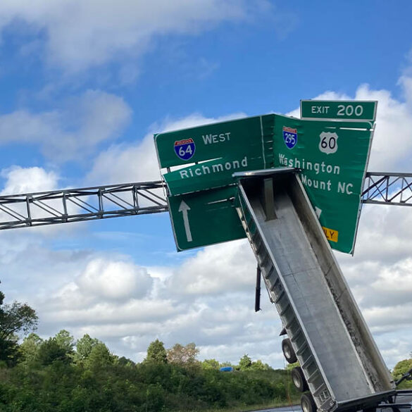 Tractor trailer crashes into highway sign on i-64, driver charged with reckless driving - photo licensed by shore news network.