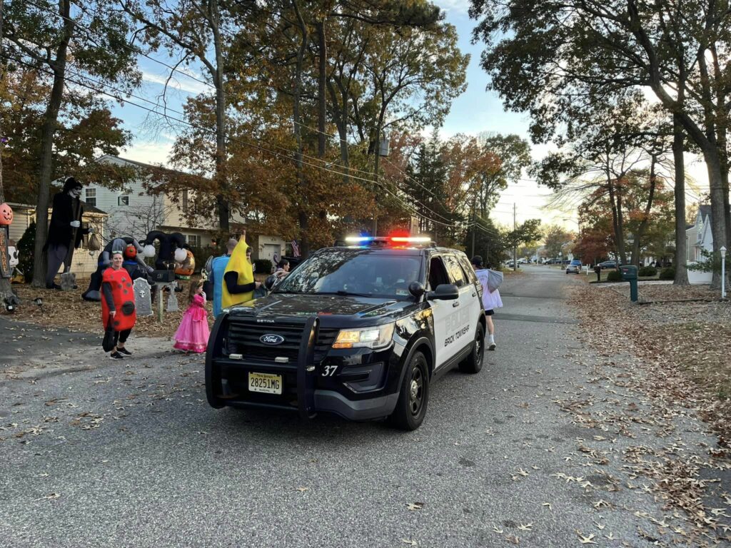 Brick Police Handing out Candy on Halloween