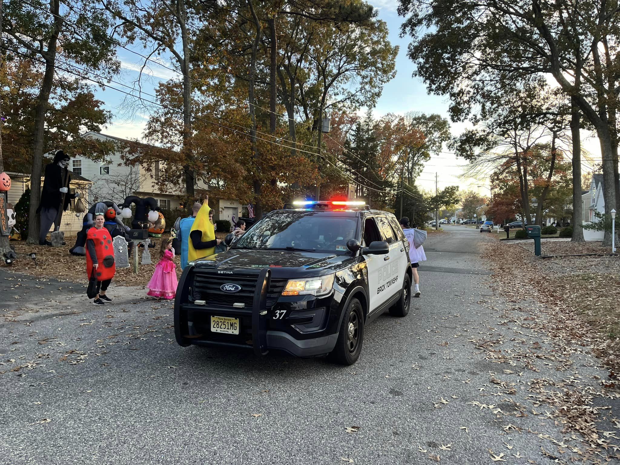 Brick Police Handing out Candy on Halloween
