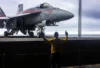 240928-N-DL824-2052 ATLANTIC OCEAN (Sept. 28, 2024) Aviation Boatswain's Mate (Aircraft Handling) 2nd Class Ronmel Quijano, a native of Miami, directs the transport of an F/A-18E Super Hornet, attached to the “Knighthawks” of Strike Fighter Squadron (VFA) 136, from the hangar bay to the flight deck aboard the Nimitz-class aircraft carrier USS Harry S. Truman (CVN 75), Sept. 28. Harry S. Truman, the flagship of the Harry S. Truman Carrier Strike Group