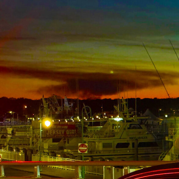 Joint-base fire clouds sunset at the jersey shore - photo licensed by shore news network.