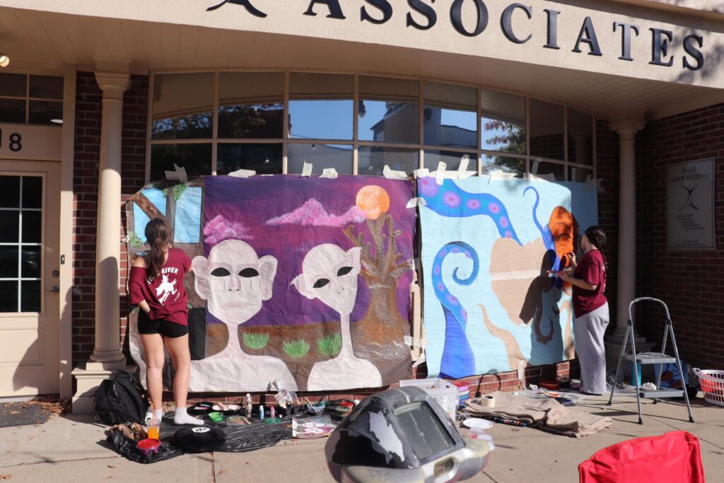 Toms River students paint downtown storefronts for 85th annual Halloween parade