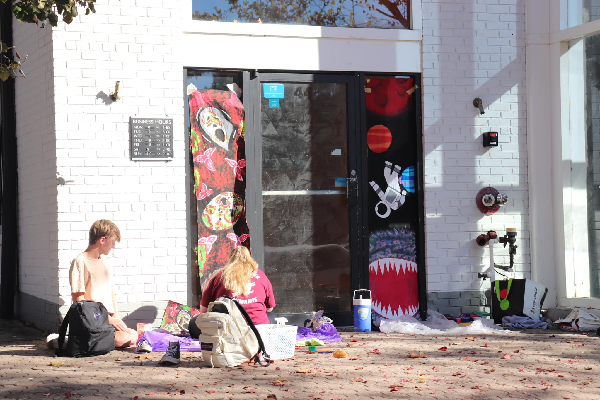 Toms River students paint downtown storefronts for 85th annual Halloween parade