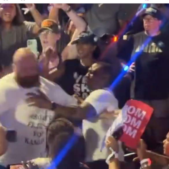 Watch: trump supporters attacked, dragged out of stadium during kamala's houston rally - photo licensed by shore news network.