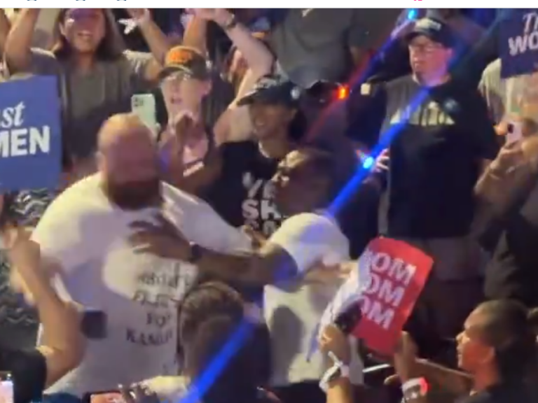 Watch: trump supporters attacked, dragged out of stadium during kamala's houston rally - photo licensed by shore news network.