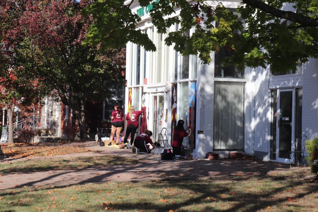 Toms River students paint downtown storefronts for 85th annual Halloween parade