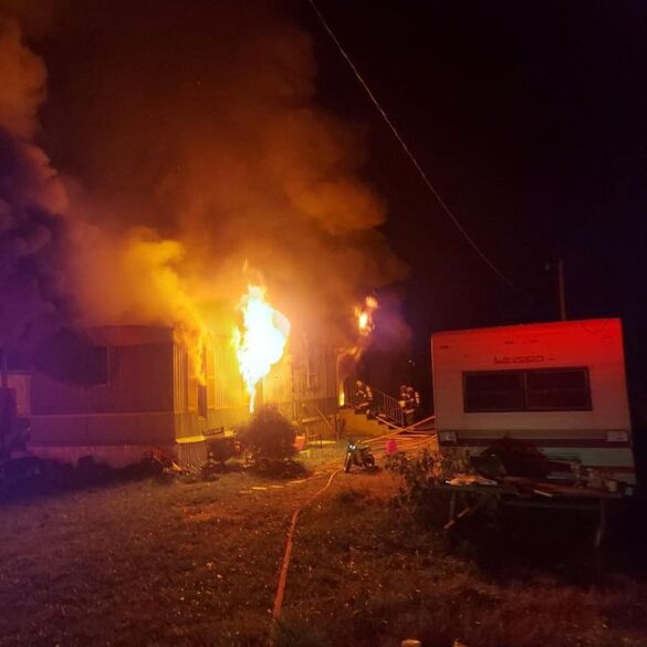 Trailer fire in tenth district extinguished; occupant escapes unharmed - photo licensed by shore news network.