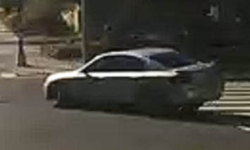 Police search for suspect vehicle after man shot outside United Medical Center
