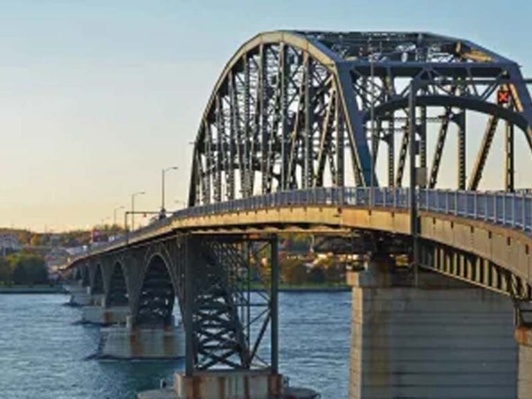 Fugitive illegal alien wanted for armed robbery arrested at new york's peace bridge in stolen car - photo licensed by shore news network.