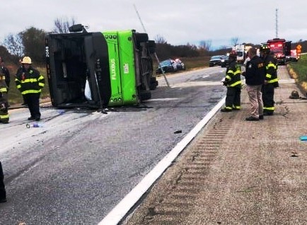 Tour Bus Overturns on I-490