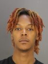 Man shot inside baltimore home as suspect is taken into custody