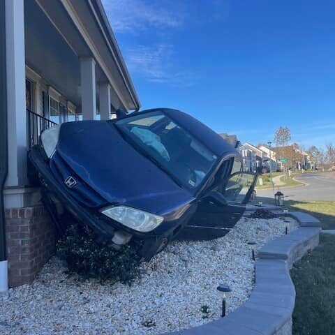 Car crashes into stafford county home; driver suffers minor injuries - photo licensed by shore news network.