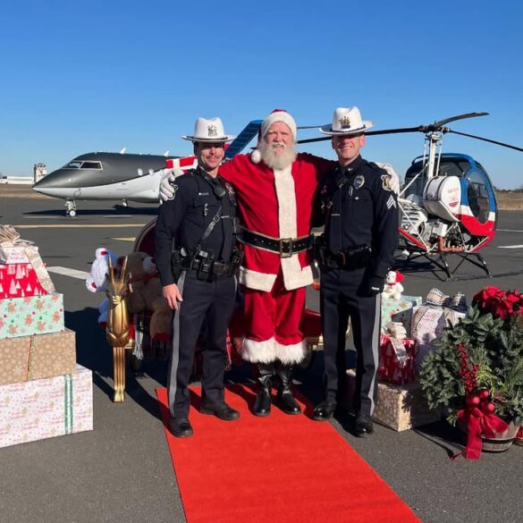 That's no drone: santa lands at new jersey jet center, delighting local children - photo licensed by shore news network.