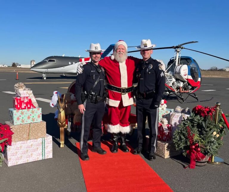 That's no drone: santa lands at new jersey jet center, delighting local children - photo licensed by shore news network.