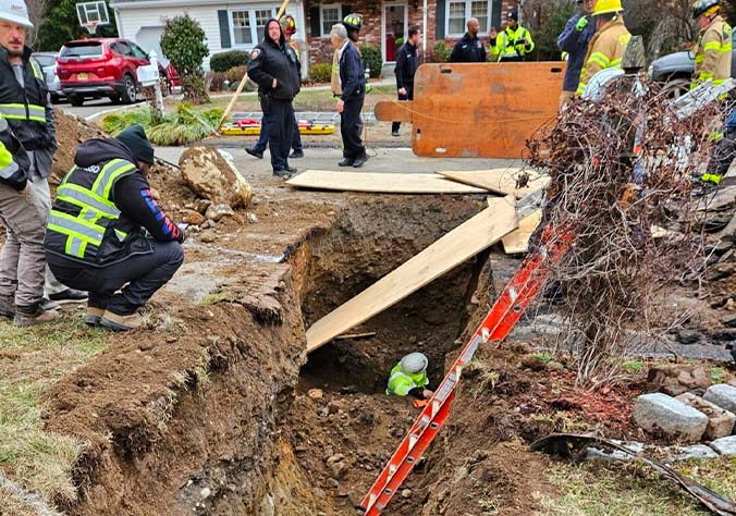 Stamford firefighters rescue worker from trench collapse
