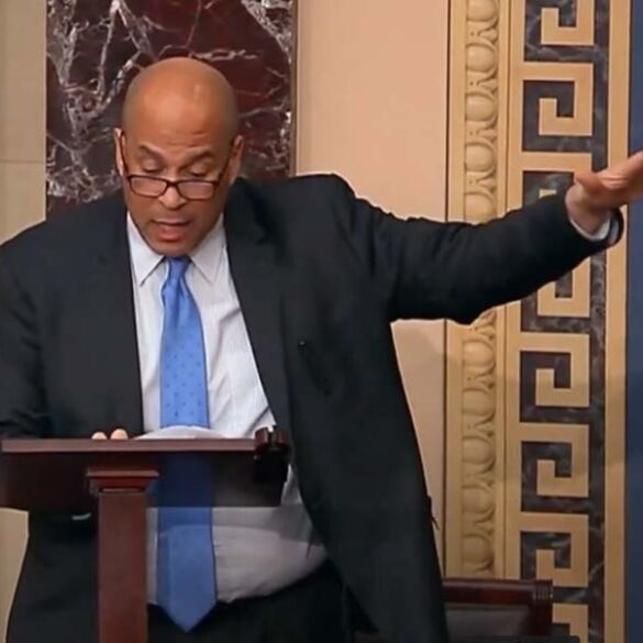 Cory booker reads poetry on senate floor, displaying several nazi-like salutes - photo licensed by shore news network.