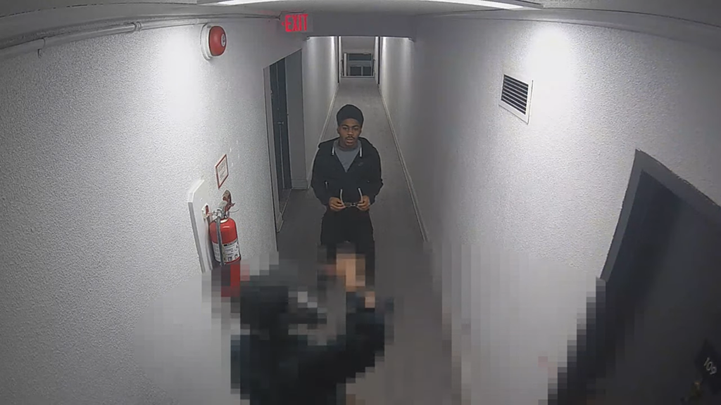 Armed suspects remain at large after a violent robbery in Northwest DC caught on camera