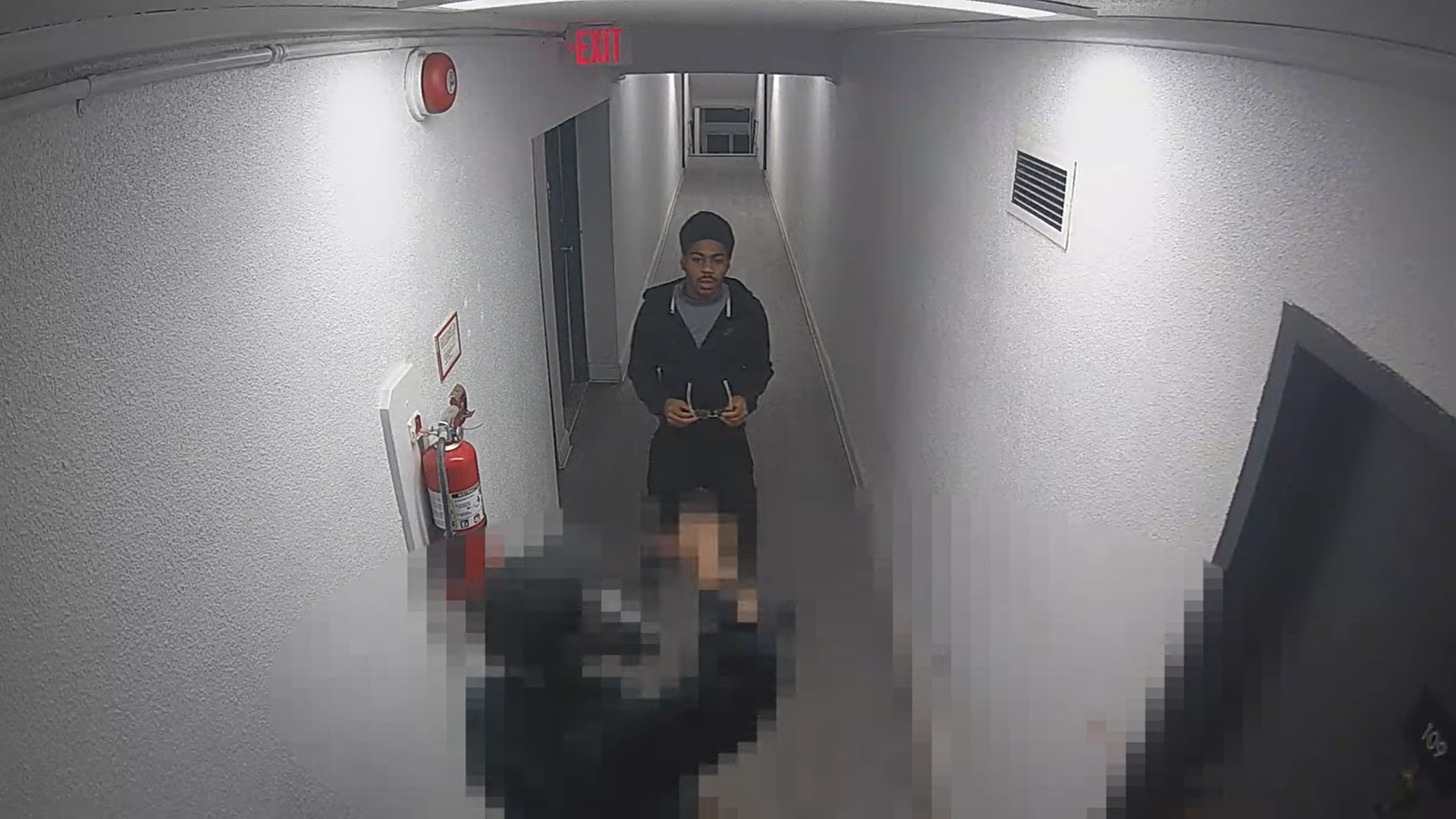 Armed suspects remain at large after a violent robbery in Northwest DC caught on camera