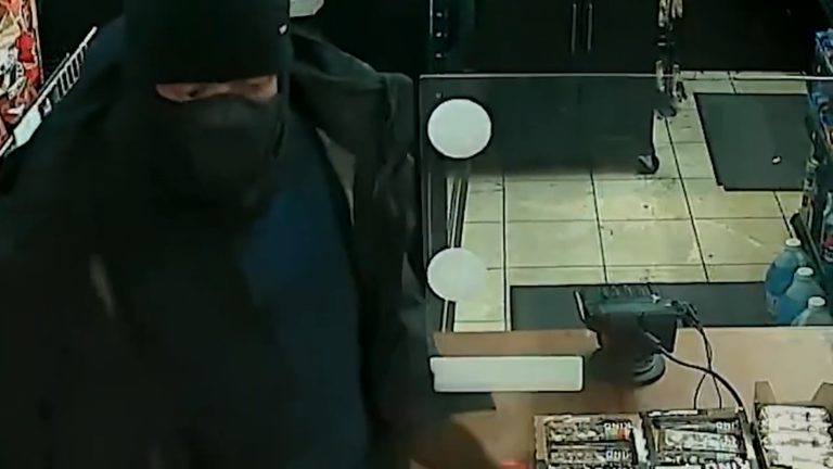 Gunman robs d. C. Business at gunpoint and escapes - photo licensed by shore news network.