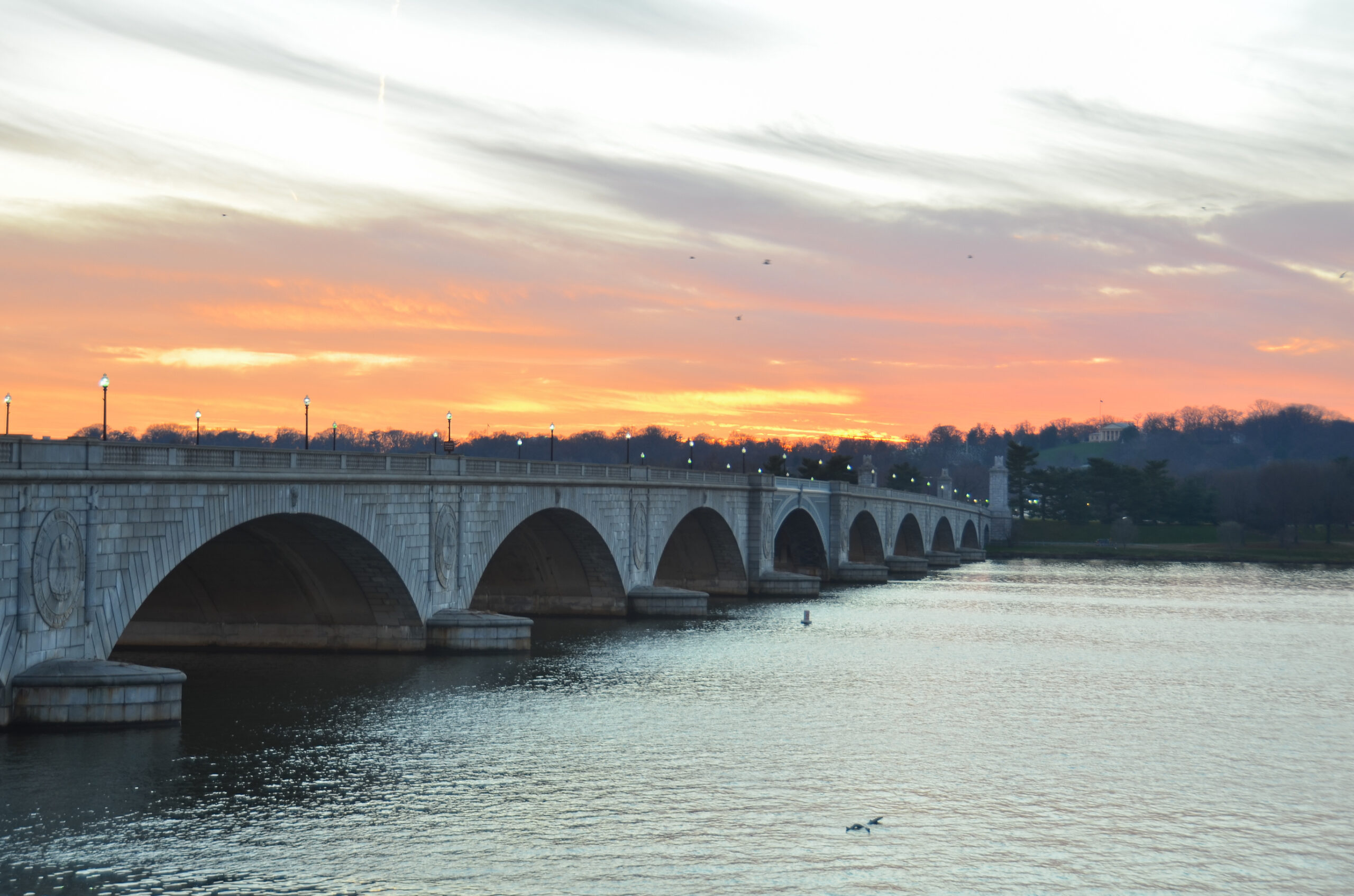 Truck plunges off Arlington Memorial Bridge into Potomac River, one dead