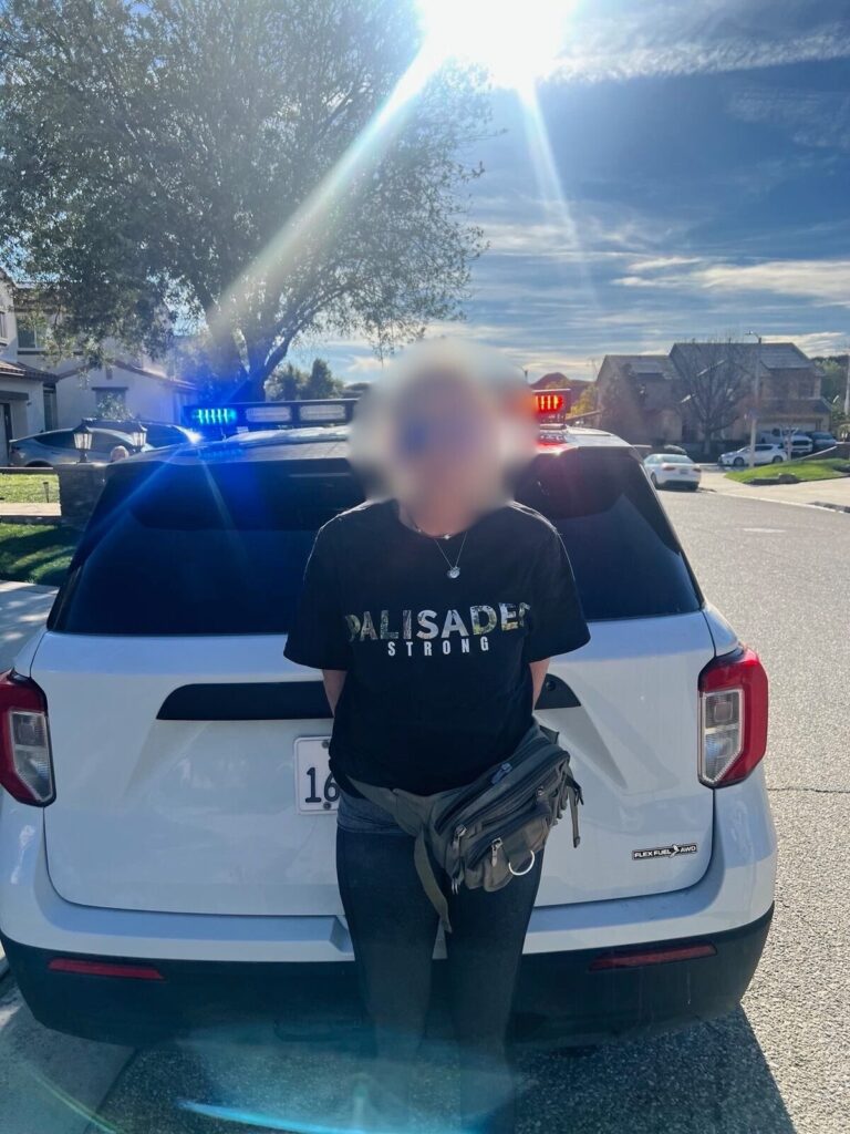 Woman wearing california strong t-shirt arrested for looting in pacific palisades - photo licensed by shore news network.