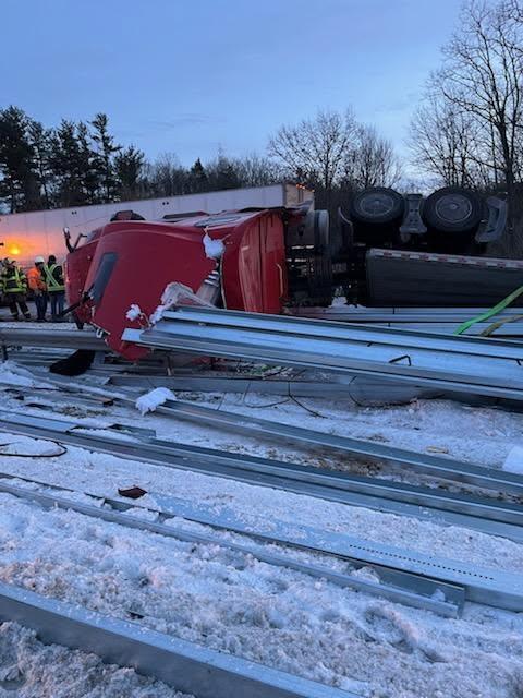Tractor-trailer rollover on New York Thruway injures two, spills steel beams