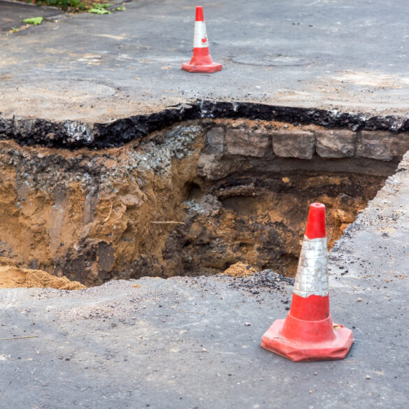 Roadwork, repairs at sinkhole.