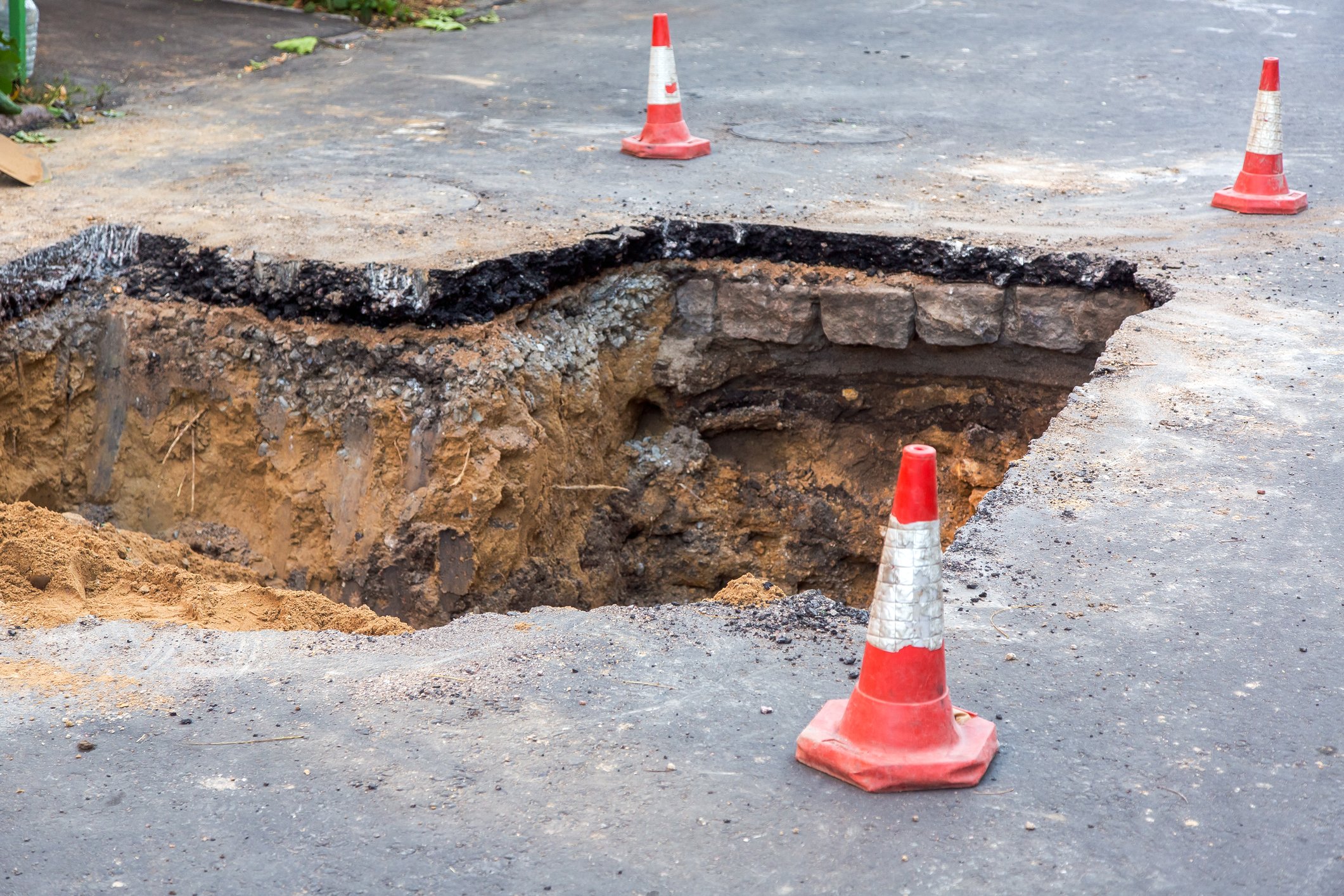 Roadwork, repairs at sinkhole.