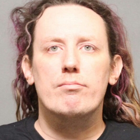 This trans woman was just arrested with a bomb at a tesla dealership - photo licensed by shore news network.