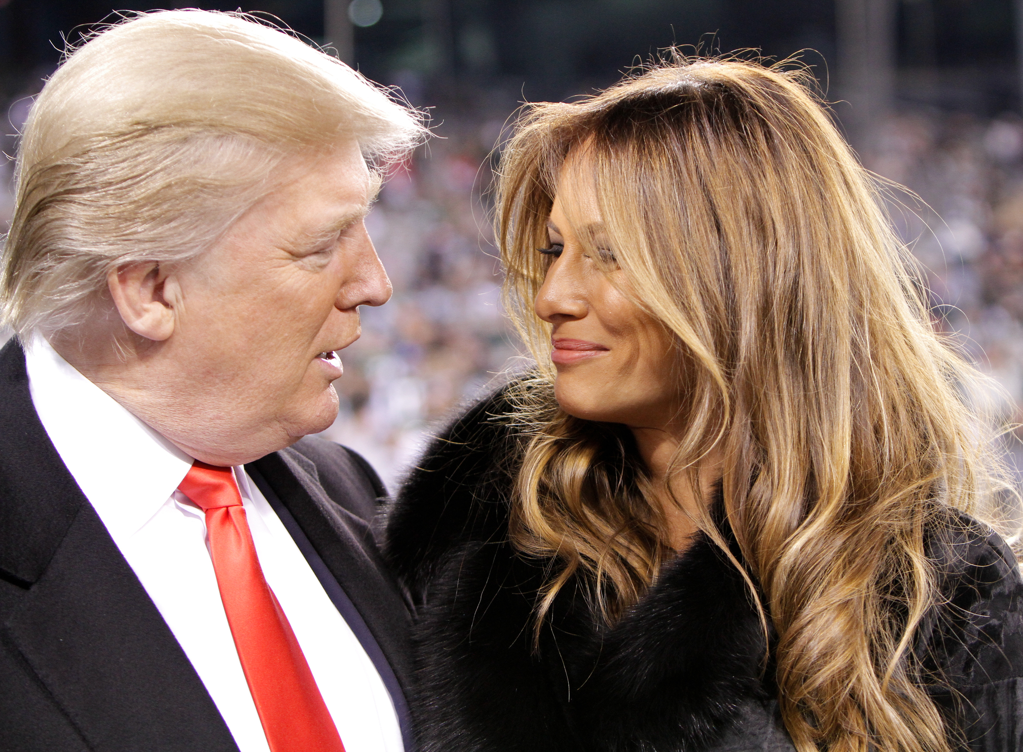 Donald Trump and wife Melania Trump before a football game at MetLife Stadium