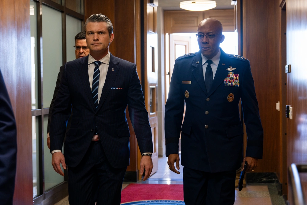 Secretary of Defense Pete Hegseth walks with Chairman of the Joint Chiefs of Staff Air Force Gen. CQ Brown, Jr. after arriving at the Pentagon, Washington, D.C., Jan. 27, 2025. (DoD photo by U.S. Navy Petty Officer 1st Class Alexander Kubitza)