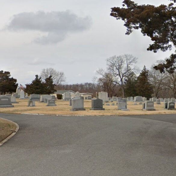 Car crashes into cemetery, strikes gravestones in wall township - photo licensed by shore news network.