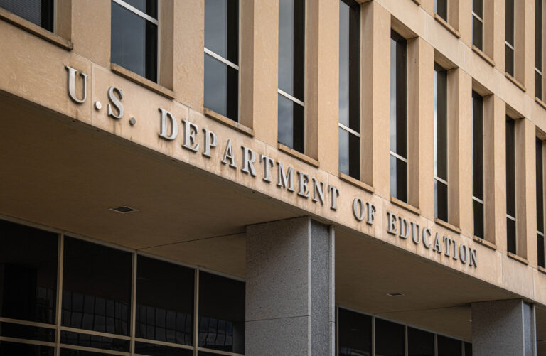 The u. S. Department of education building lettering over doorway in washington d. C