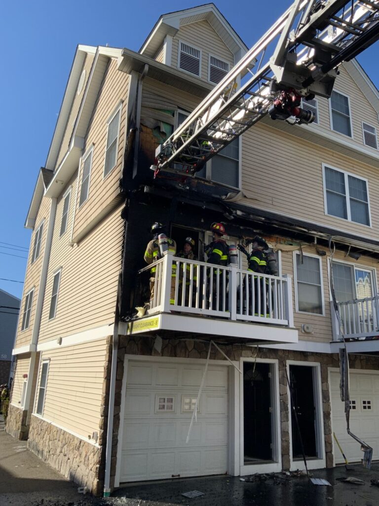 Stamford firefighters quickly extinguish west side townhouse fire - photo licensed by shore news network.