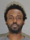Man arrested weeks after victim gunned down on city street