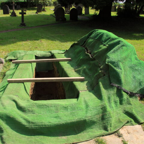 West virginia gravedigger arrested after baby’s corpse found exposed, casket dumped over hill - photo licensed by shore news network.