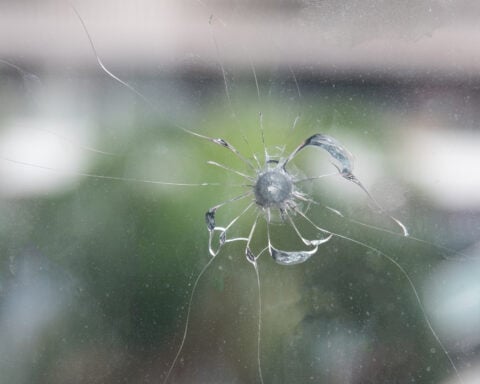 Bullet Hole in Window